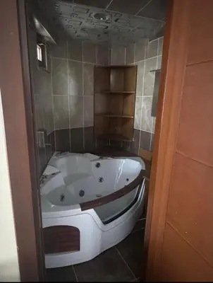 a bathroom with a bath tub in a room at grand life hotel in Corlu