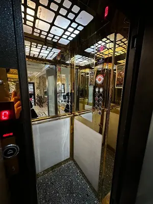 a door of a subway train with a reflection in it at Hotel Alyon Beyoğlu in Istanbul