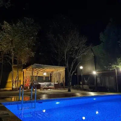 Detached villa with a heated pool and garden
