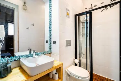 a bathroom with a sink and a toilet at Timeless House Overlooking the Golden Horn with Sea - Nilorayn in Istanbul