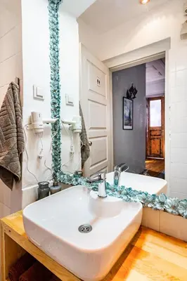 a bathroom with a sink and a mirror at Timeless House Overlooking the Golden Horn with Sea - Nilorayn in Istanbul