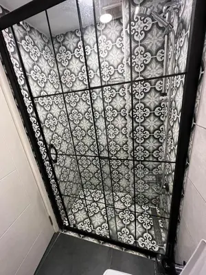 a room with a tile ceiling with a pattern at AYD Apartment Taksim in Istanbul