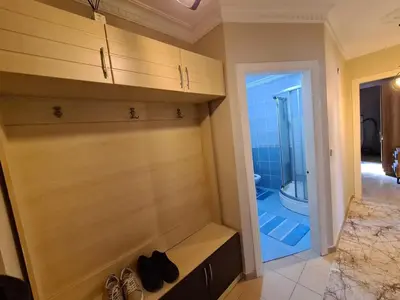 a bathroom with a walk in shower and a sink at Specius Flat Near Yeditepe Univ in Istanbul