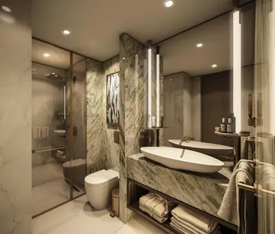 a bathroom with a tub and a sink and a toilet at Rayelin Hotel Taksim in Istanbul