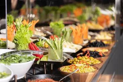 a buffet filled with lots of different types of food at Rayelin Hotel Taksim in Istanbul