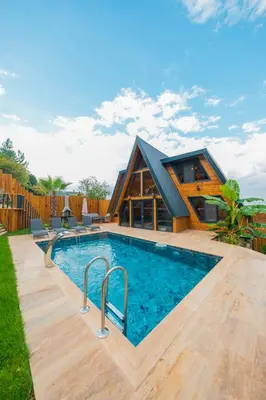 a house with a swimming pool in the yard at Localita Sapanca in Sapanca