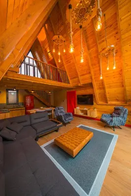 a large living room with a couch and a table at Localita Sapanca in Sapanca