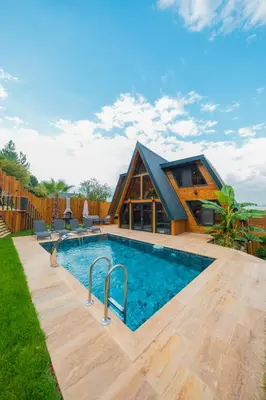 a house with a swimming pool in the yard at Localita Sapanca in Sapanca