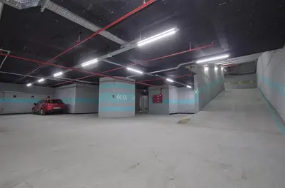 an empty parking garage with a car parked in it at Beyoglu Hacımimi Gardens içinde özel bahçeli daire in Istanbul