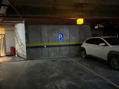 a parking garage with a car parked in it at CIFT MANZARa in Istanbul