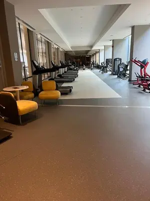 a gym with rows of chairs and tables and bikes at CIFT MANZARa in Istanbul