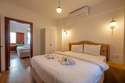 a hotel room with a bed with towels on it at New homes oldcity in Istanbul