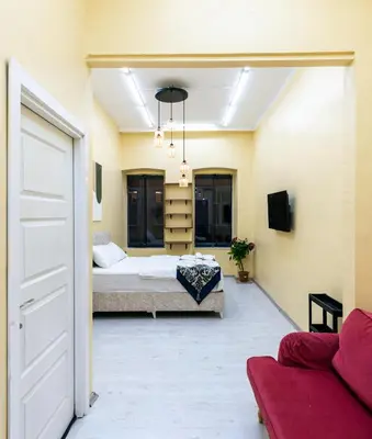 a bedroom with a bed and a couch in a room at Galata Comfortable 12 Suits in Istanbul