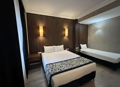 a hotel room with two beds at B Corner Hotel Bistro in Istanbul