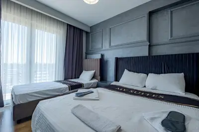 a hotel room with two beds in a room at My SUİTES in Istanbul