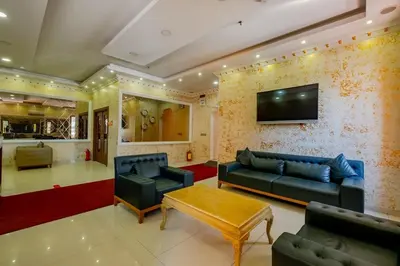 a living room with a couch and a tv at My SUİTES in Istanbul