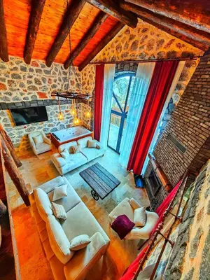 an overhead view of a living room with couches at Taş Devri Konaklama in İznik
