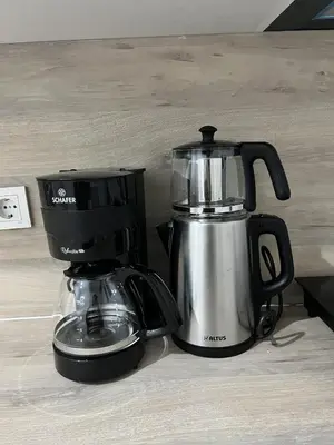 a coffee maker and blender sitting on a counter at Modern Apartment in the Heart of Kadıköy in Istanbul