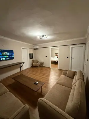 a living room with a couch and a coffee table at Pera Line Yalova in Yalova