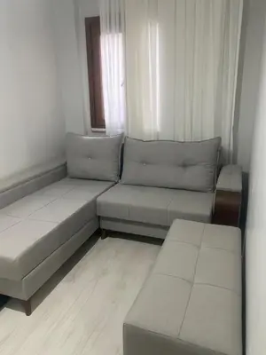 a living room with two couches and a window at historic stay istanbul in Istanbul