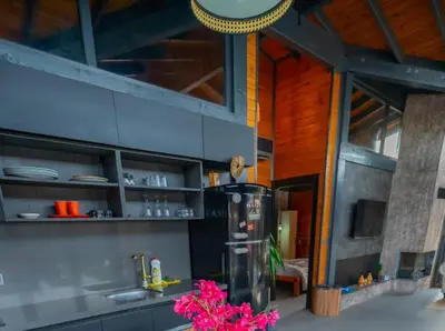 a kitchen with a stainless steel refrigerator in a room at Palmera suit in Sapanca