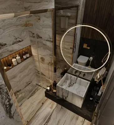 a bathroom with a shower with a sink and a mirror at Trendlife Hotels Galata in Istanbul