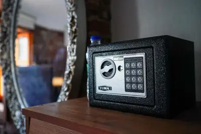 a small radio sitting on a table in front of a mirror at İstanbul Galata Squit Apartments in Istanbul