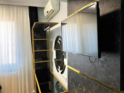 a mirror on a wall in a room at Orange Airport Hotel in Istanbul
