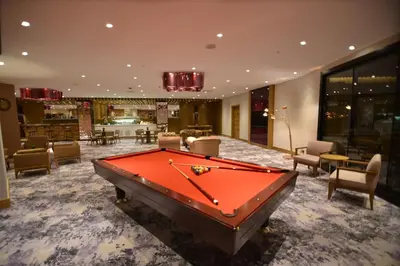 a pool table in the middle of a room at Crowne Plaza Florya Istanbul by IHG in Istanbul