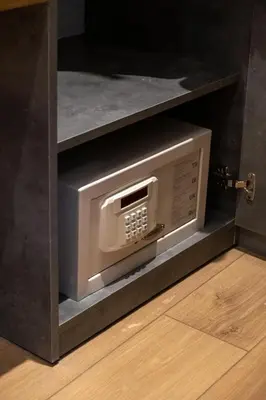a microwave oven on a shelf in a kitchen at İstanbul Platine Apartment in Taksim