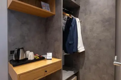 a kitchen with a wooden counter with a coffee pot on it at İstanbul Platine Apartment in Taksim