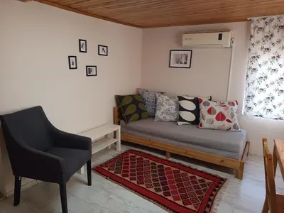 a living room with a couch and a chair at La Casa25 in Istanbul