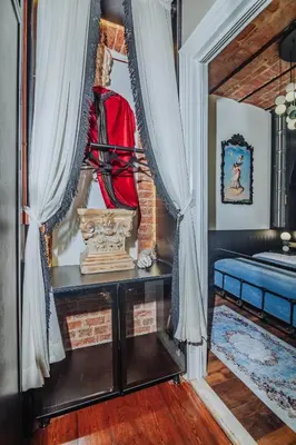 a bedroom with a bed and a red backpack at Allegory of Taksim in Istanbul