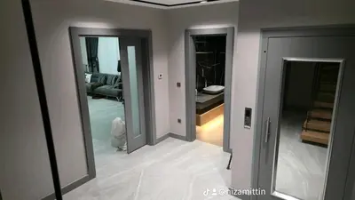 a room with two mirrors and a room with a bed at Villa with private pool for daily rent in Istanbul in Buyukcekmece