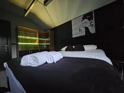 a bedroom with two beds with towels on them at SARIKÖŞK HOTEL Kadıköy in Istanbul