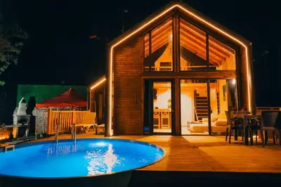 a house with a swimming pool in front of it at Sapancaacarkonaklama in Sapanca
