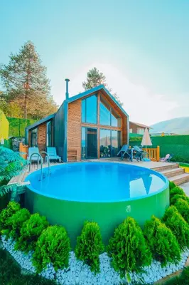 a house with a large pool in the yard at Sapancaacarkonaklama in Sapanca