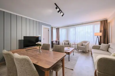 a living room with a couch and a table at House Kadıköy in Istanbul