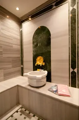 a bathroom with a sink and a mirror at Blue Mosq Pansiyon & Apart in Istanbul