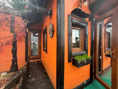 an exterior view of a house with orange walls at Sapanca Turuncu Hobbit Evi in Sapanca