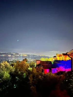 a view of a city at night at Sapanca Kırmızı Hobbit Evi in Sapanca