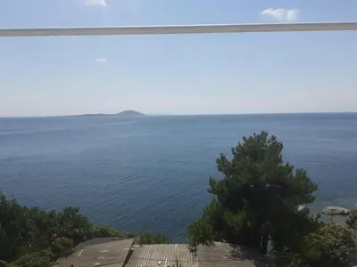 a view of the ocean from a house at Art & Natura in Marmara