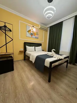 a bedroom with a large bed in a room at 24Suitetaksim in Istanbul