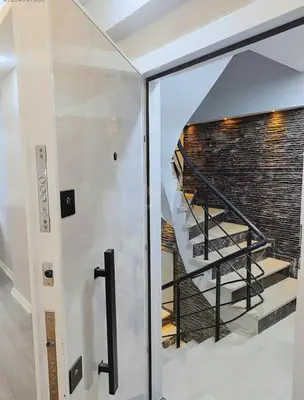 a view of a staircase through a glass door at Innova Suit Hotel in Istanbul