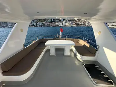 a table on the back of a boat in the water at Rotavira YAT KİRALAMA PLATFORMU in Istanbul