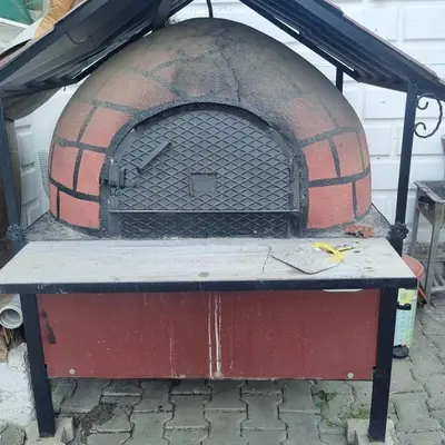 a brick oven sitting on top of a table at Luxury Family Villa with Private Pool & Slide in Gemlik