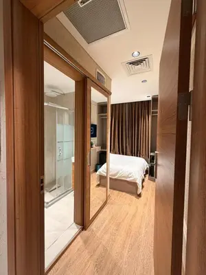 a bedroom with a bed and a mirror at City Istiklal in Istanbul