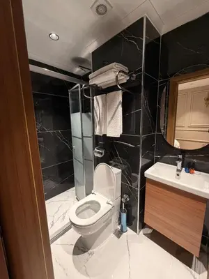 a bathroom with a toilet and a sink at City Istiklal in Istanbul
