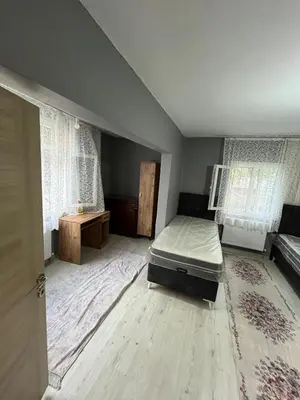 a bedroom with a bed in the middle of a room at Taksim metro central Suites hotel in Istanbul