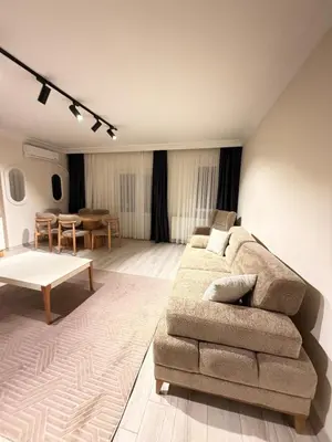a living room with a couch and a table at Luxury Apartment In A Great Location 10 in Istanbul